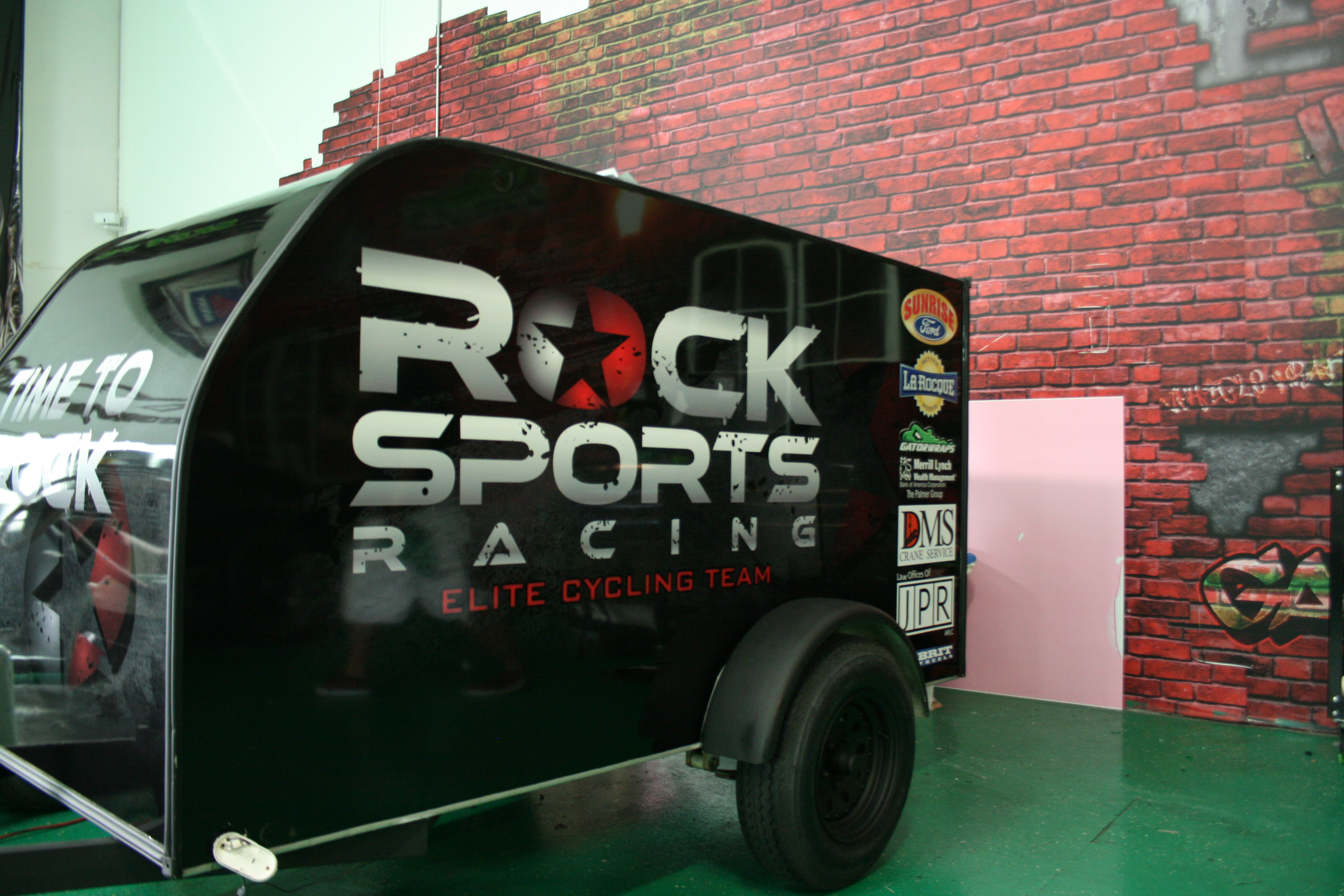 rock sports racing elite cycling team trailer wrap