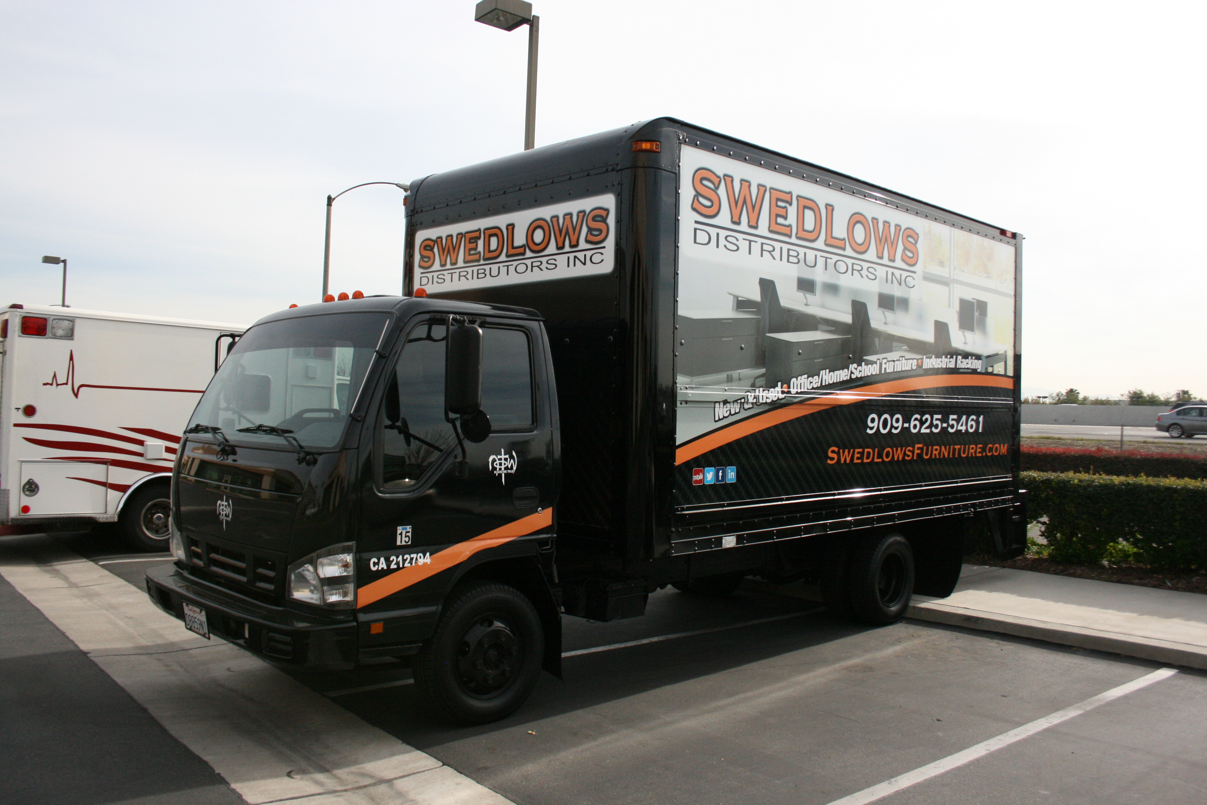 swedlows furniture trailer wrap